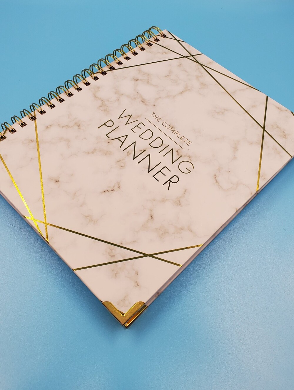 The Complete Wedding Planner" by Your Perfect Day a 18-month countdown planner